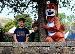 cyril the squirrel with boys in sedbergh